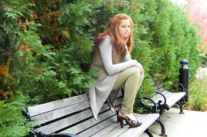 Woman sitting on a park bench