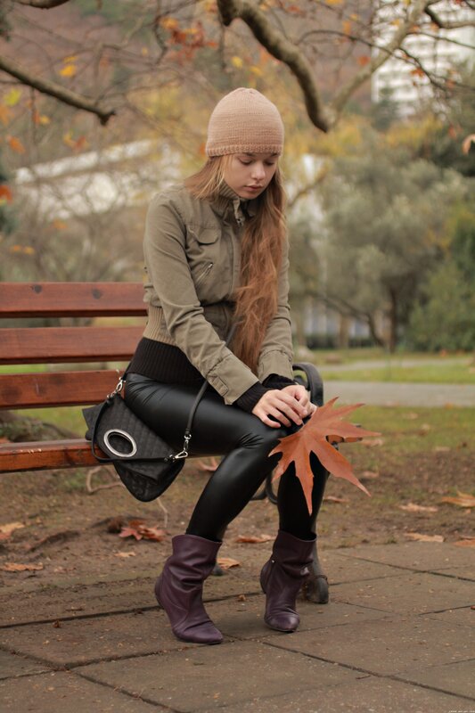Woman sitting on a park bench
