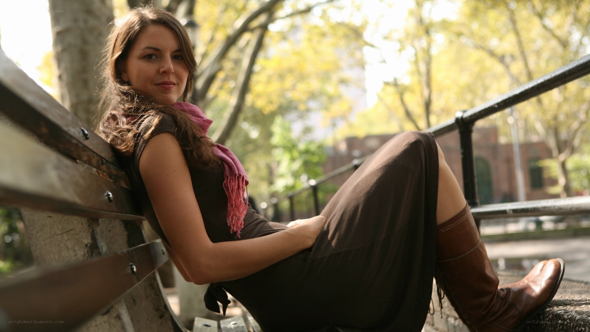 Woman sitting on a park bench