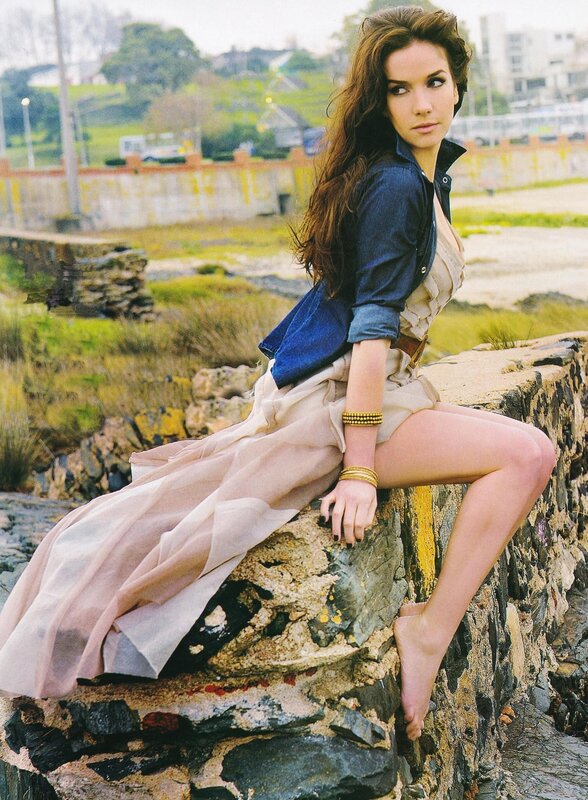 woman sitting on a rock