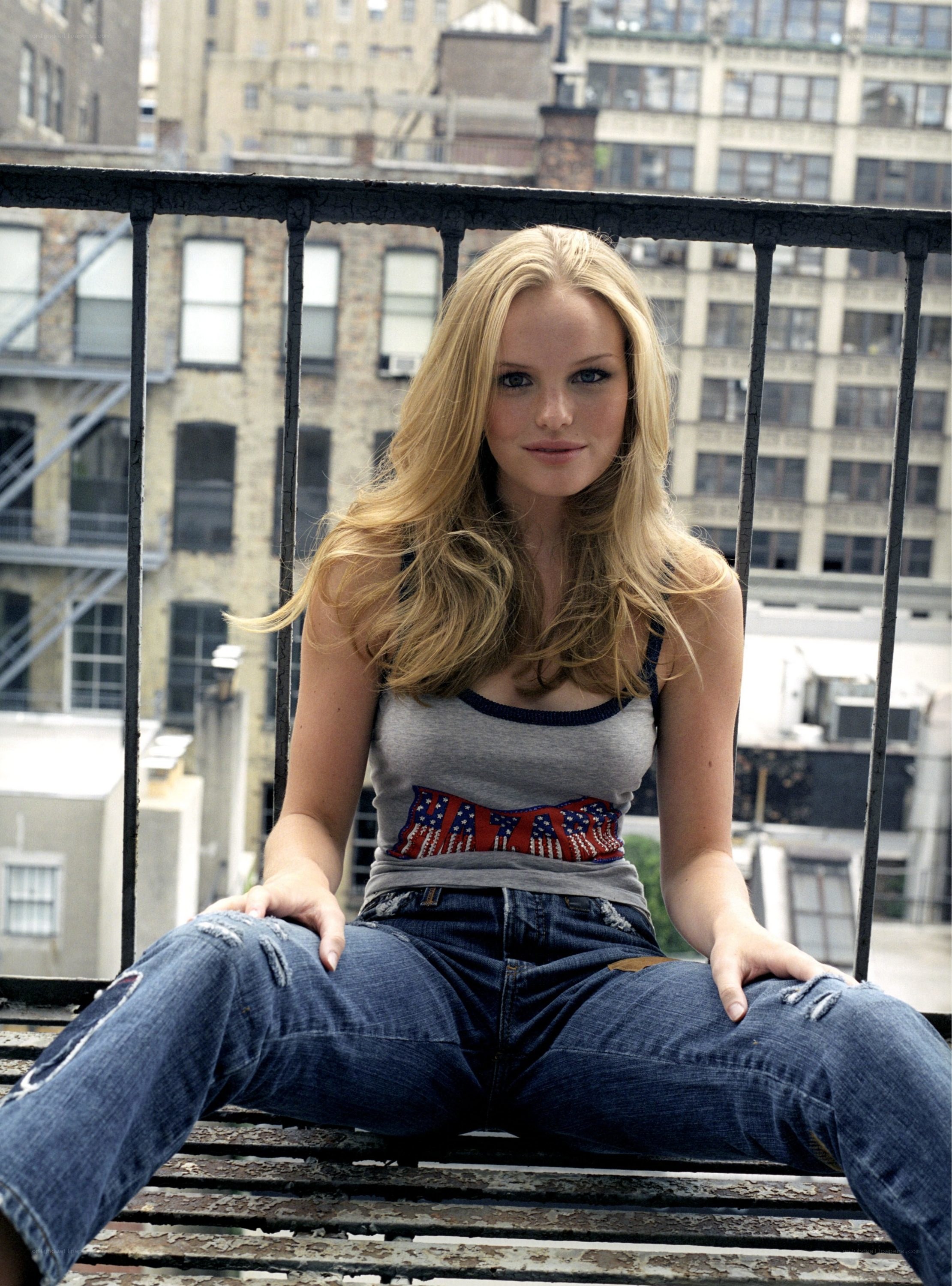 woman sitting on a rooftop