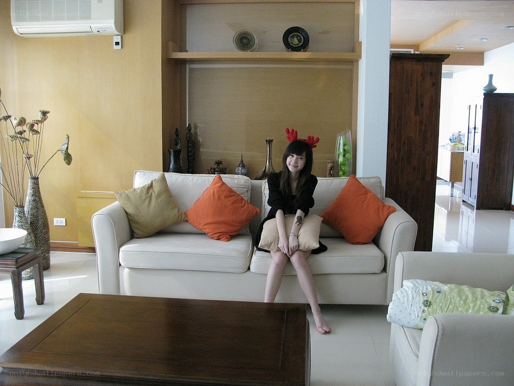 woman sitting on a sofa
