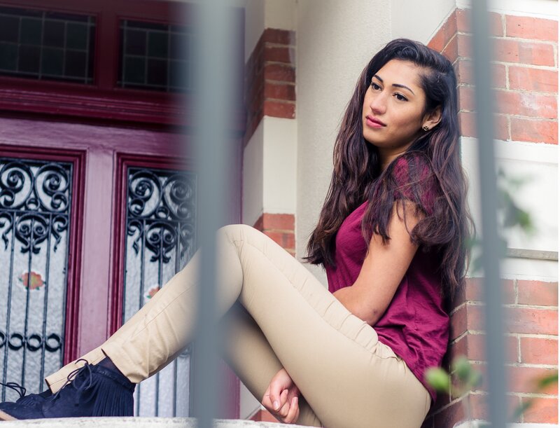 woman sitting on a step