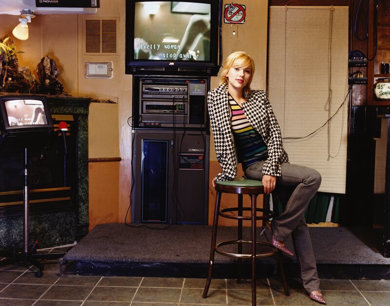 woman sitting on a stool