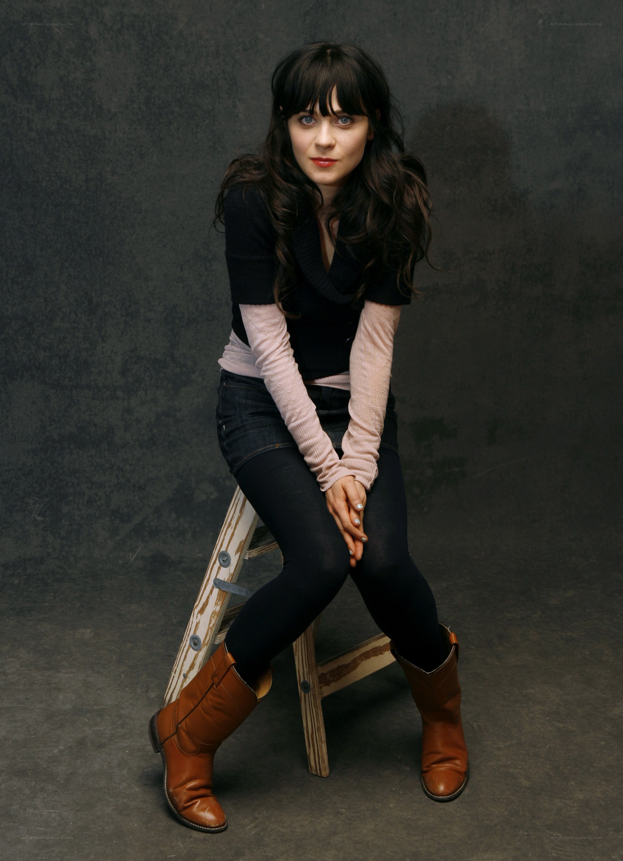 woman sitting on a stool