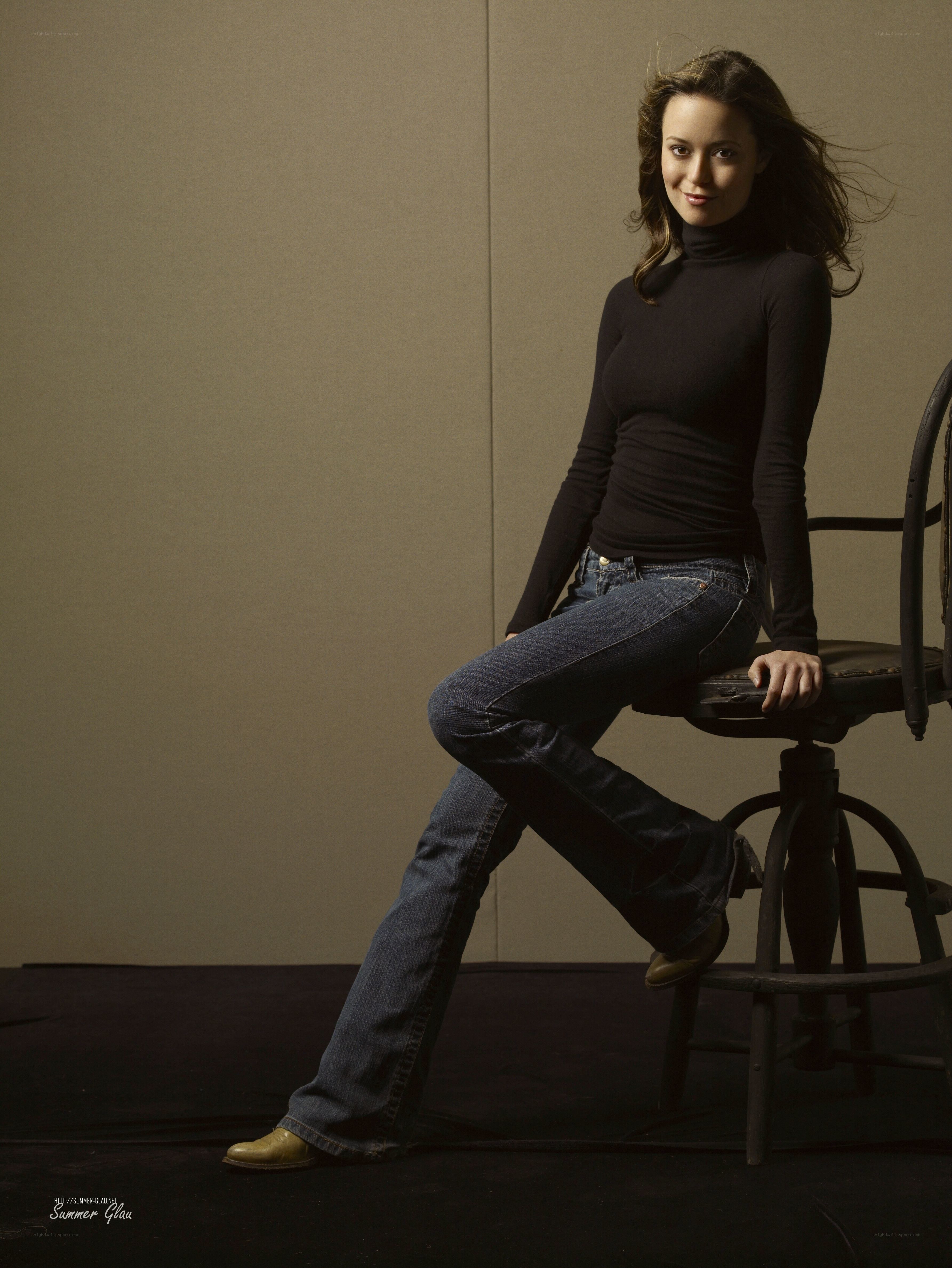 woman sitting on a stool