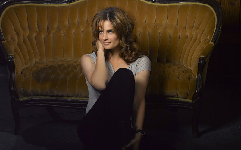 woman sitting on a vintage couch