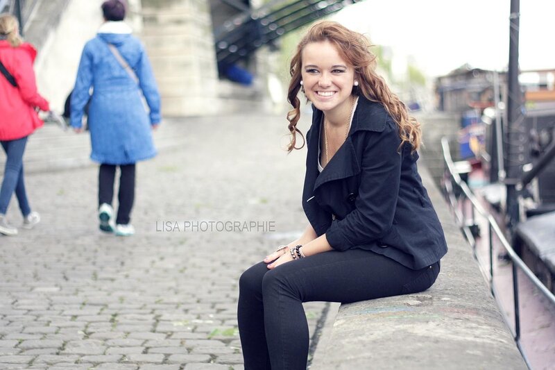 Woman Sitting on a Wall — Black