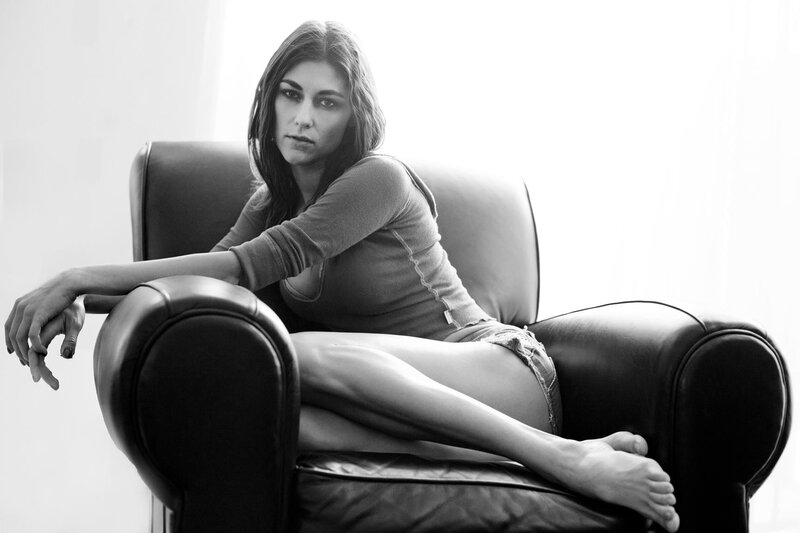 woman sitting on armchair