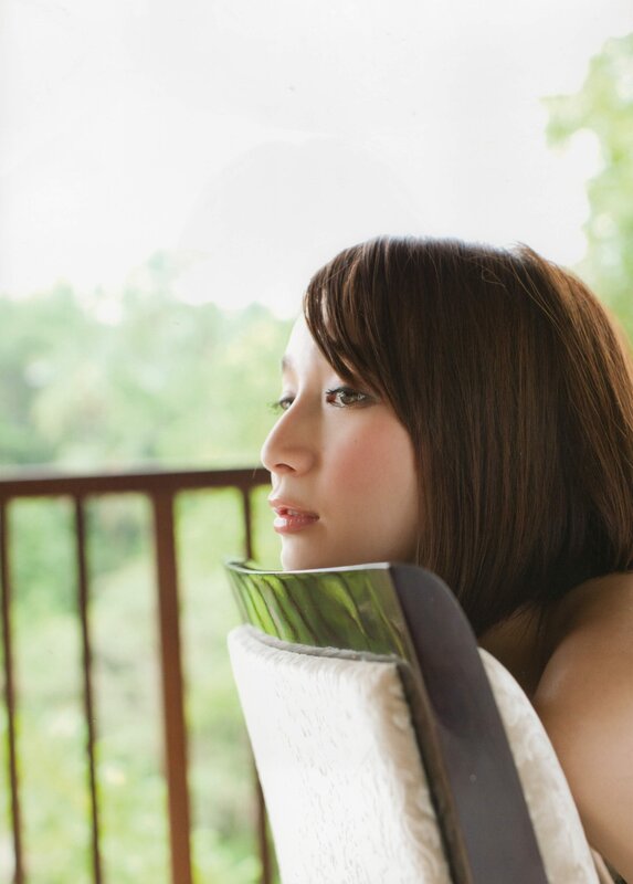 woman sitting on balcony