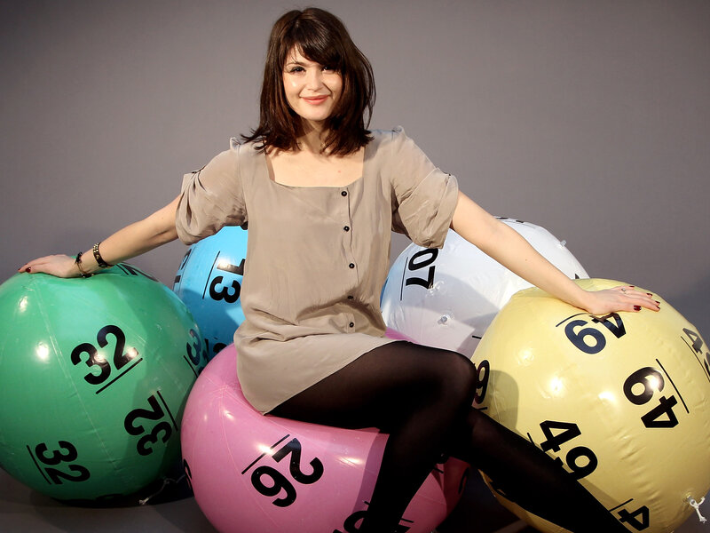 Woman Sitting on Balls