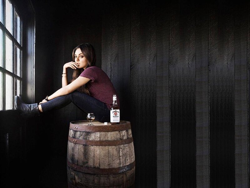 Woman Sitting on Barrel — Brown, Dramatic