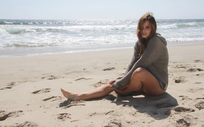Woman sitting on beach