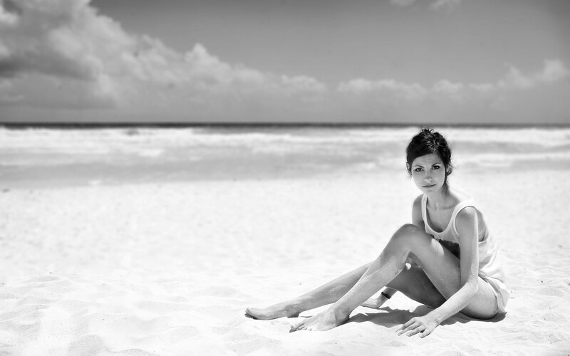 Woman Sitting on Beach — Black, Serene, Afternoon, Photograph