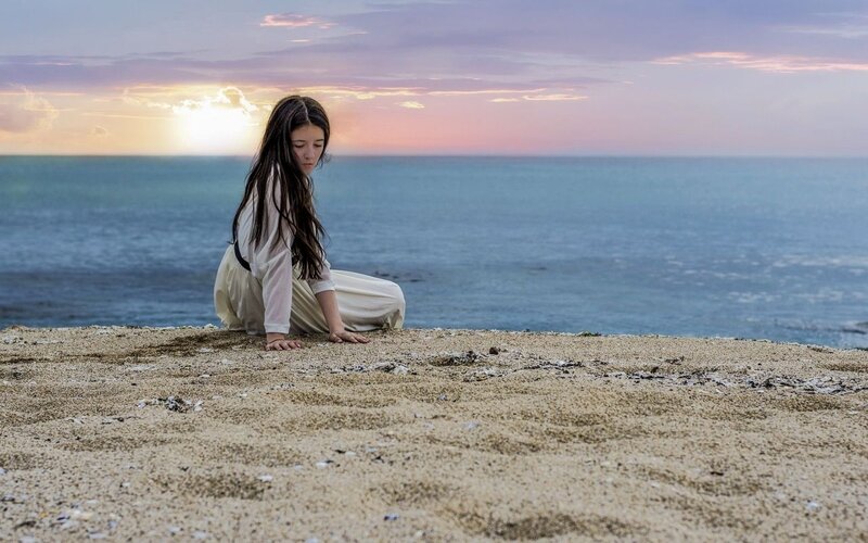 Woman Sitting on Beach — Blue, Serene, Sunset, Photograph, Ocean