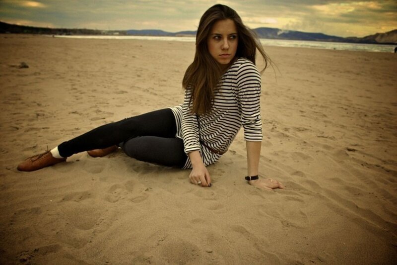 Woman Sitting on Beach — Brown, Dramatic, Sunset