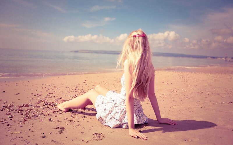 Woman Sitting on Beach — Pink, Serene