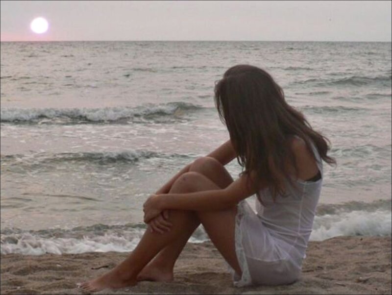 Woman Sitting on Beach — White, Calm, Sunset