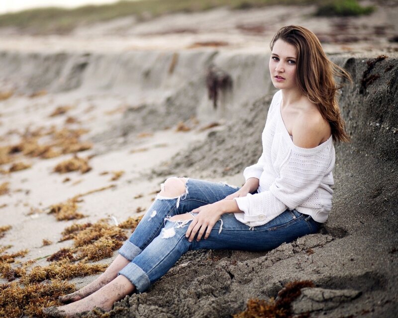 Woman Sitting on Beach — White, Contemplative