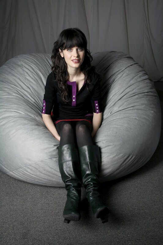 woman sitting on beanbag chair