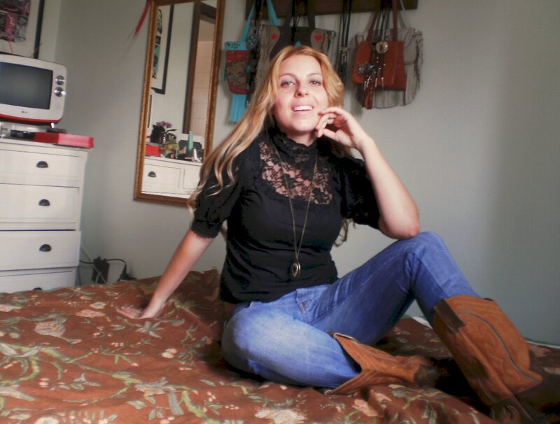 Woman Sitting on Bed — Black, Casual
