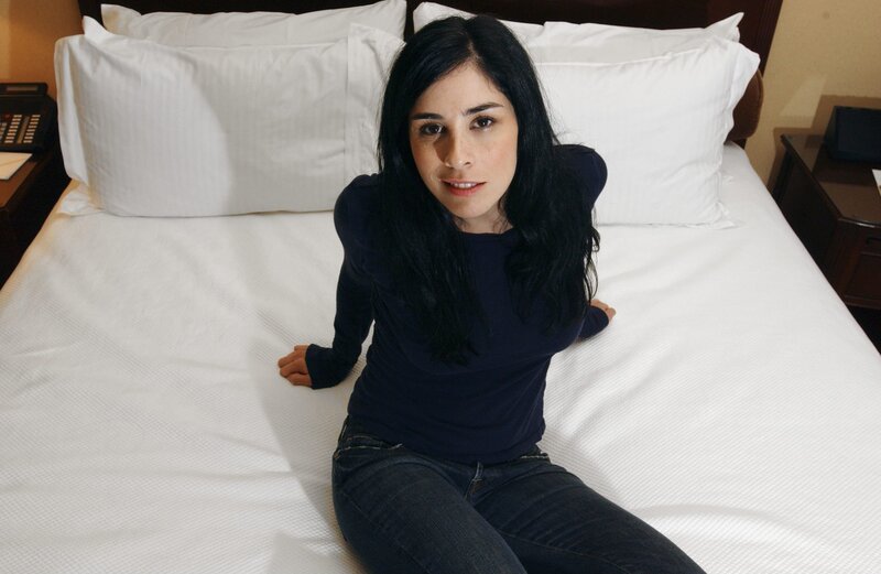 Woman Sitting on Bed — White, Neutral