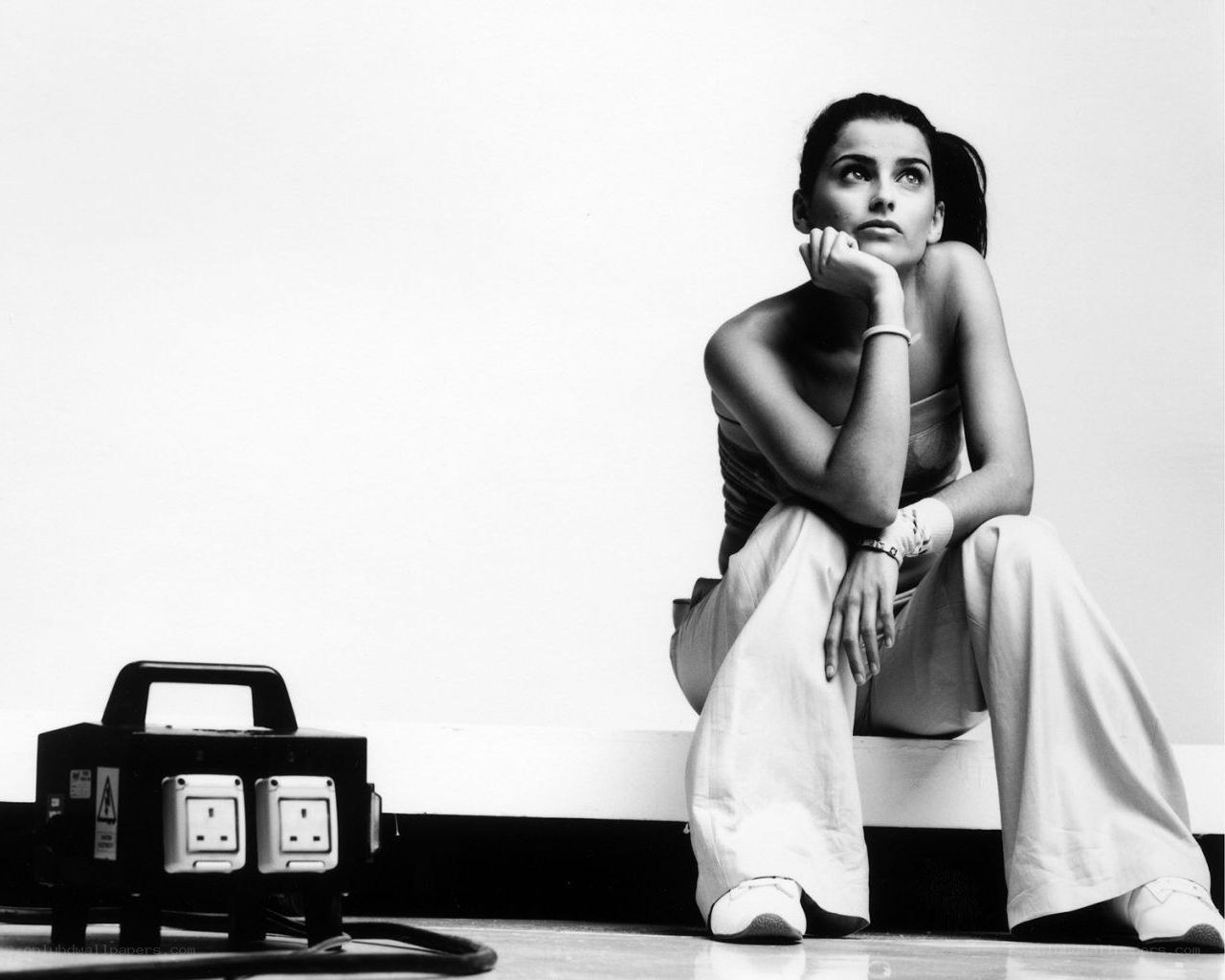 woman sitting on bench