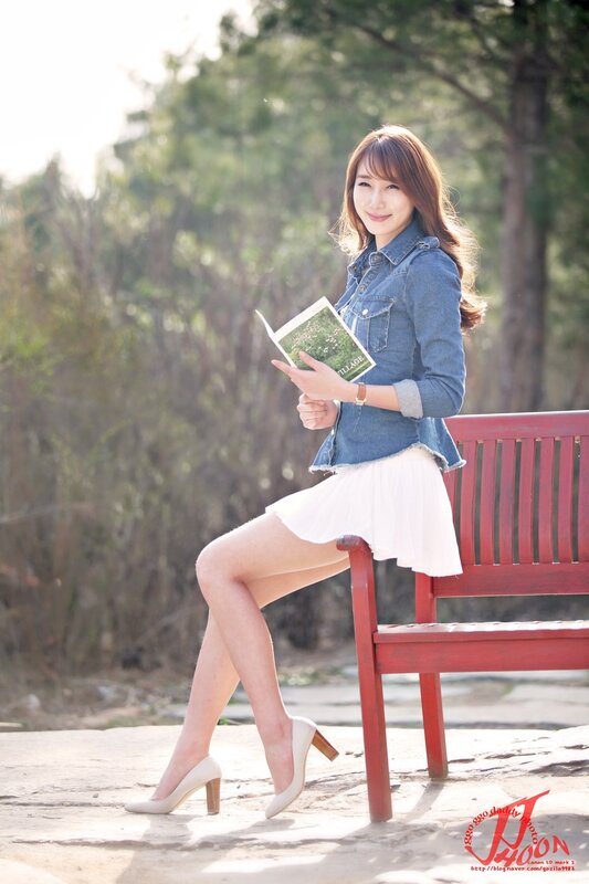 Woman Sitting on Bench — Blue, Serene, Afternoon, Photograph
