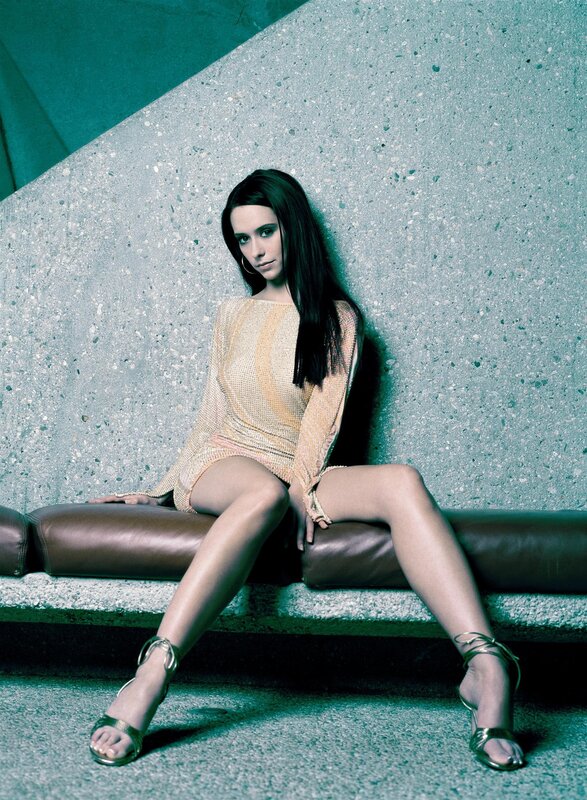 Woman Sitting on Bench — Gray, Dramatic, Photograph, Heels