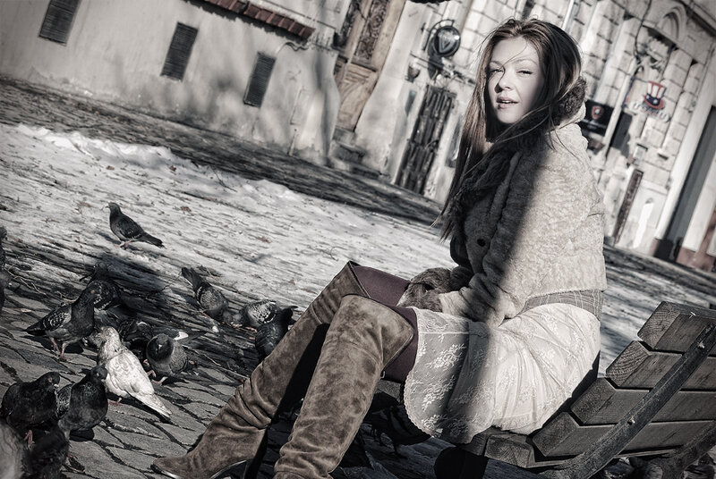 Woman Sitting on Bench — Gray, Dramatic, Winter