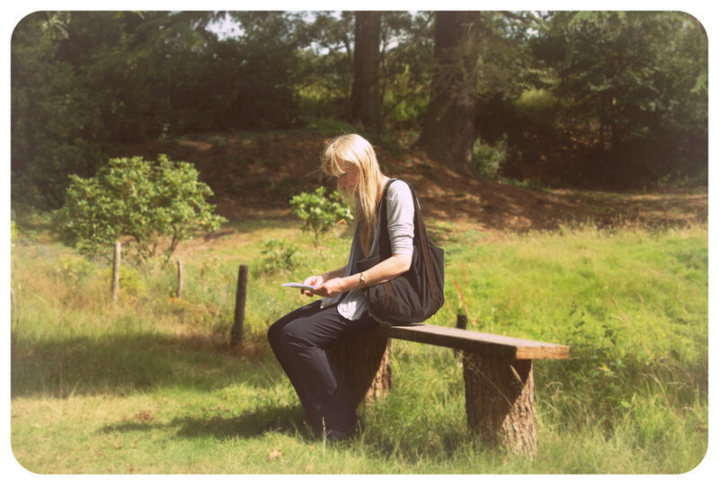 Woman Sitting on Bench — Green, Calm