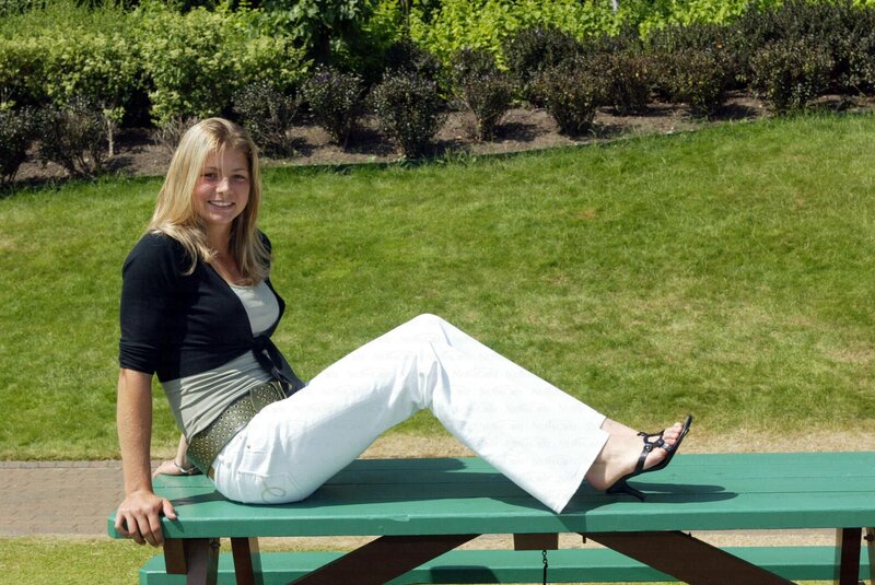 Woman Sitting on Bench — Green, Relaxed, Afternoon, Photograph