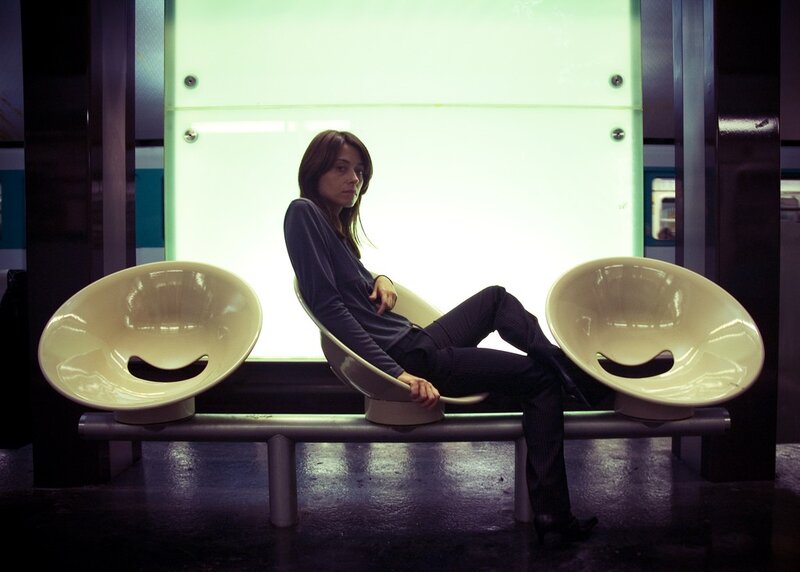Woman Sitting on Bench — White, Dramatic, Night