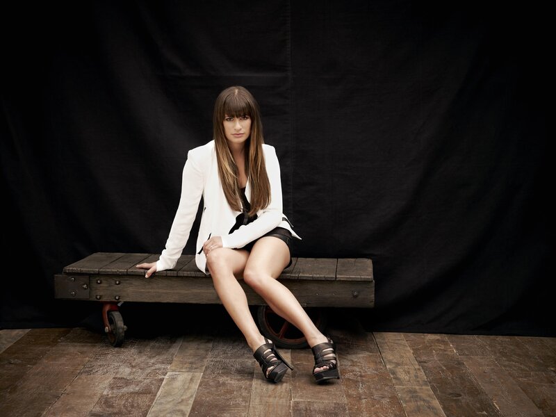 Woman Sitting on Bench — White, Dramatic