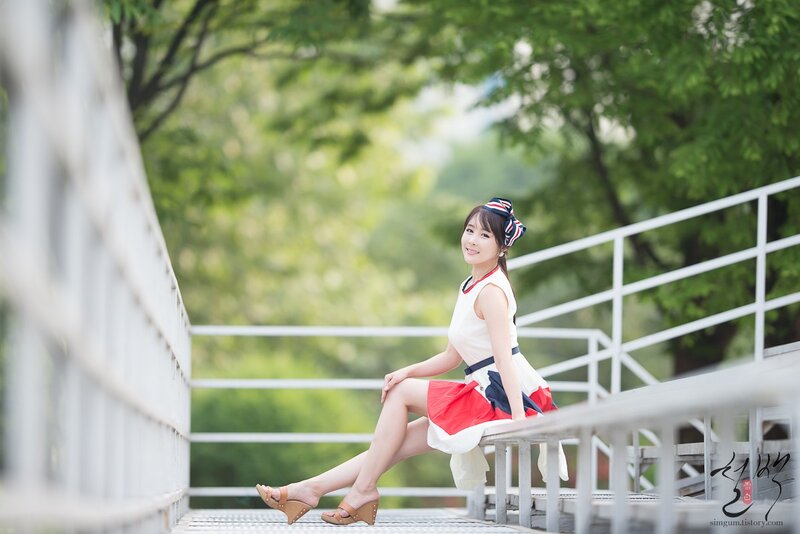 Woman Sitting on Bench — White, Serene, Summer