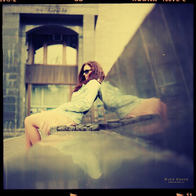 Woman Sitting on Bench — Yellow, Dramatic