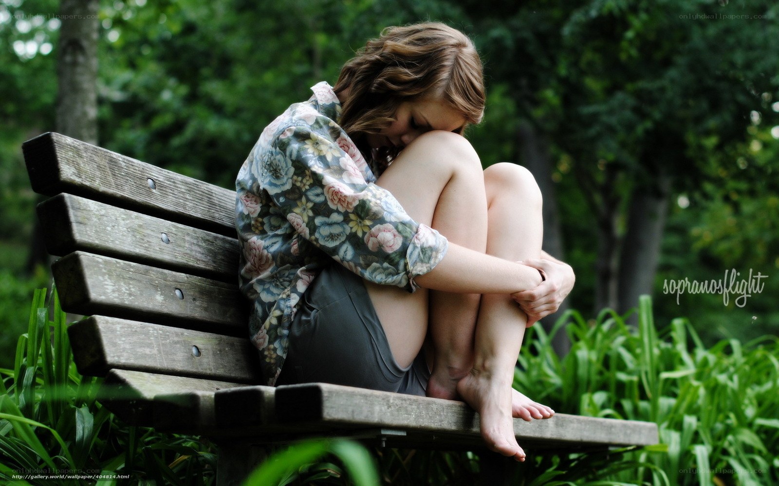 woman sitting on bench