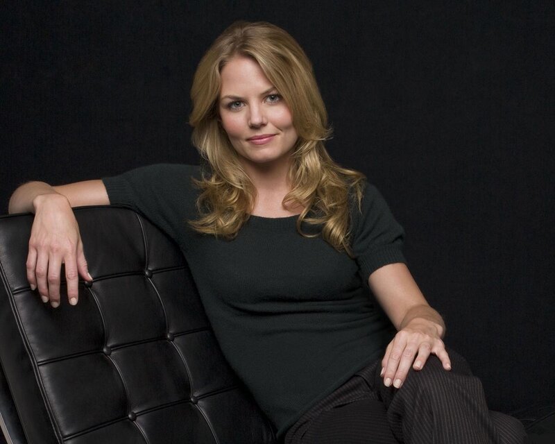 woman sitting on black chair