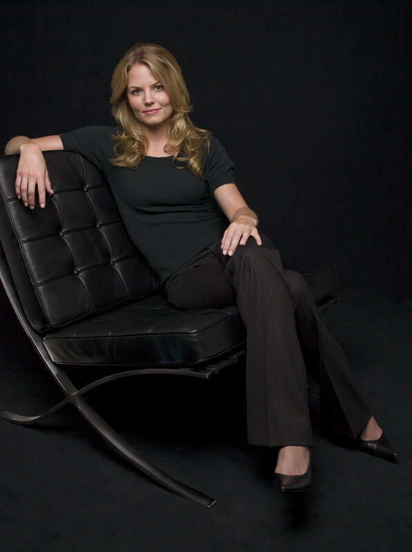 woman sitting on black chair