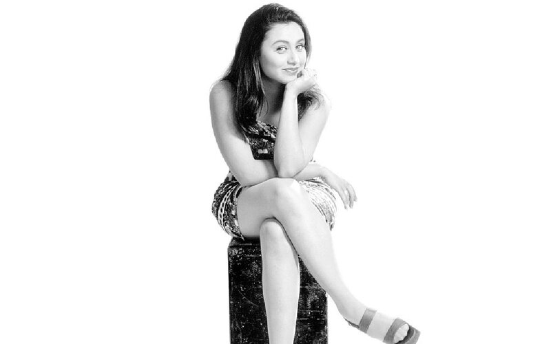Woman Sitting on Block — Black