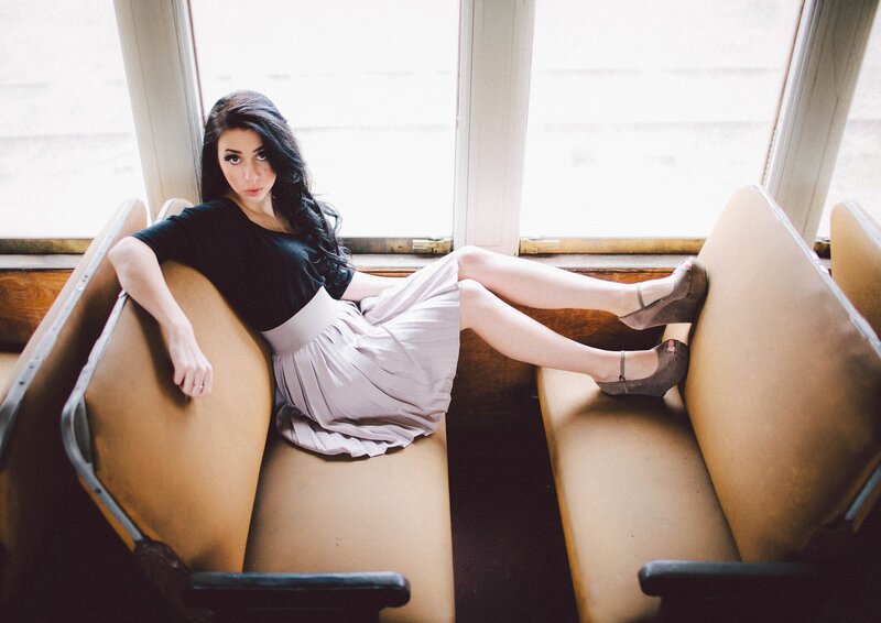 woman sitting on bus seat
