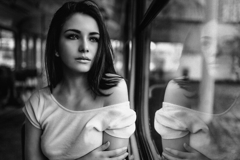 Woman Sitting on Bus