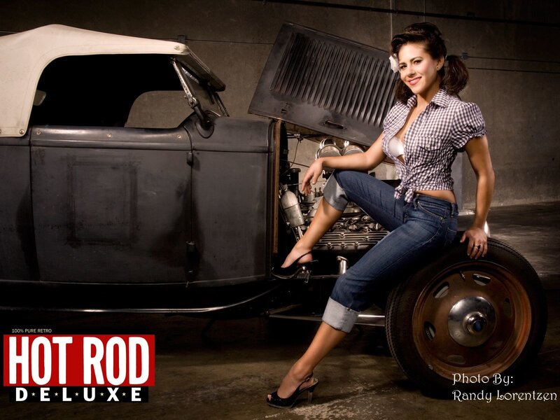 Woman Sitting on Car Wheel
