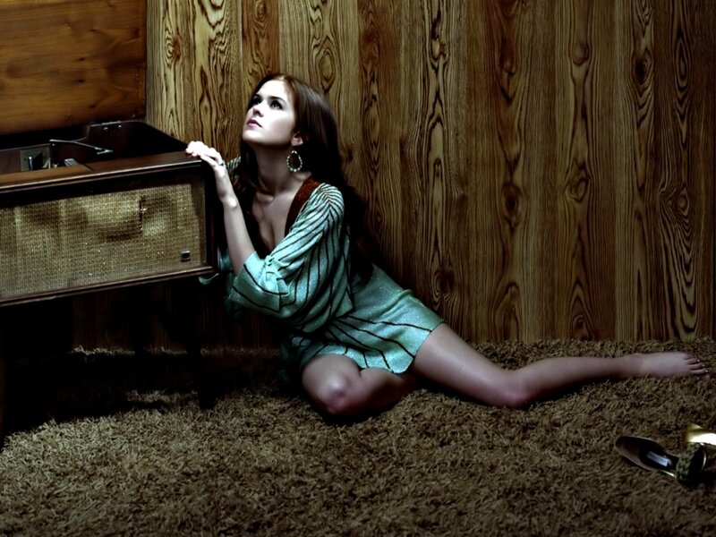 Woman Sitting on Carpet — Brown