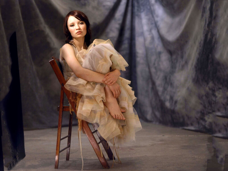 Woman Sitting on Chair — Beige, Dramatic