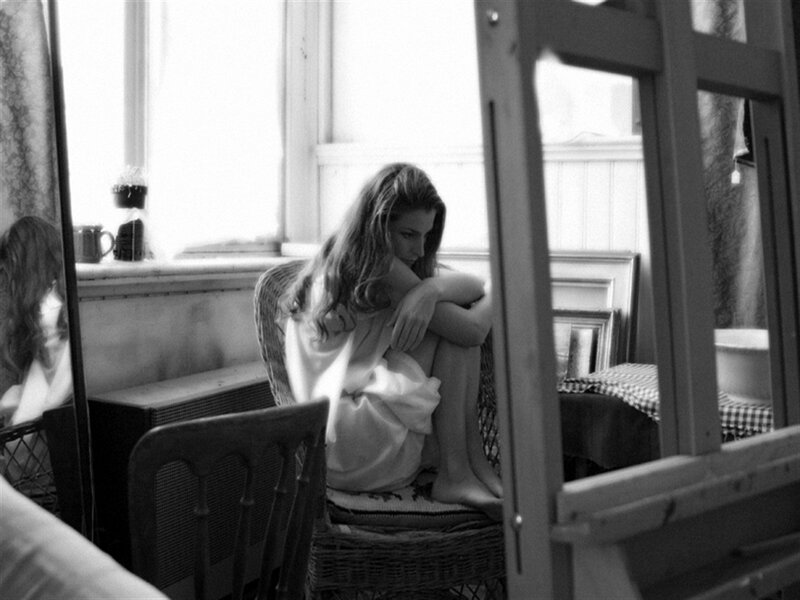 Woman Sitting on Chair — Black, Contemplative, Morning