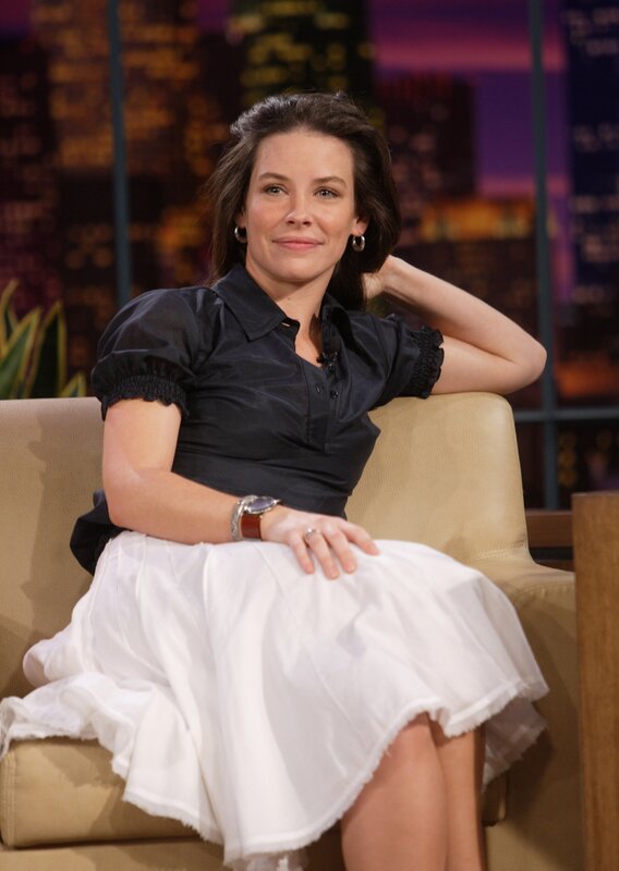 Woman Sitting on Chair — Black, Relaxed, Night, Photograph