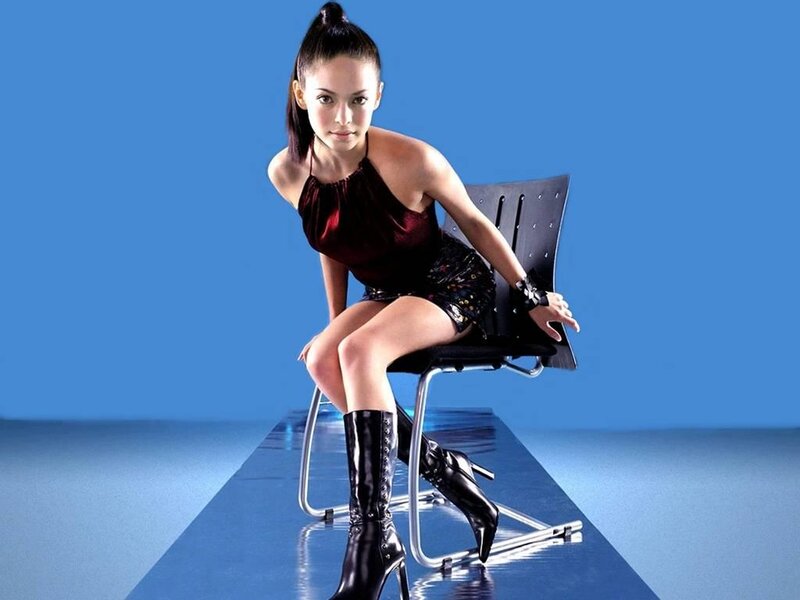 Woman Sitting on Chair — Blue, Confident, Photograph, Boots