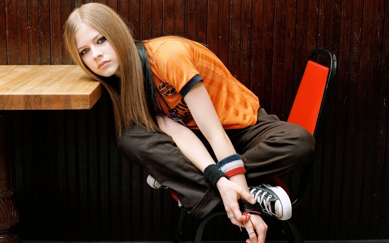 Woman Sitting on Chair — Orange