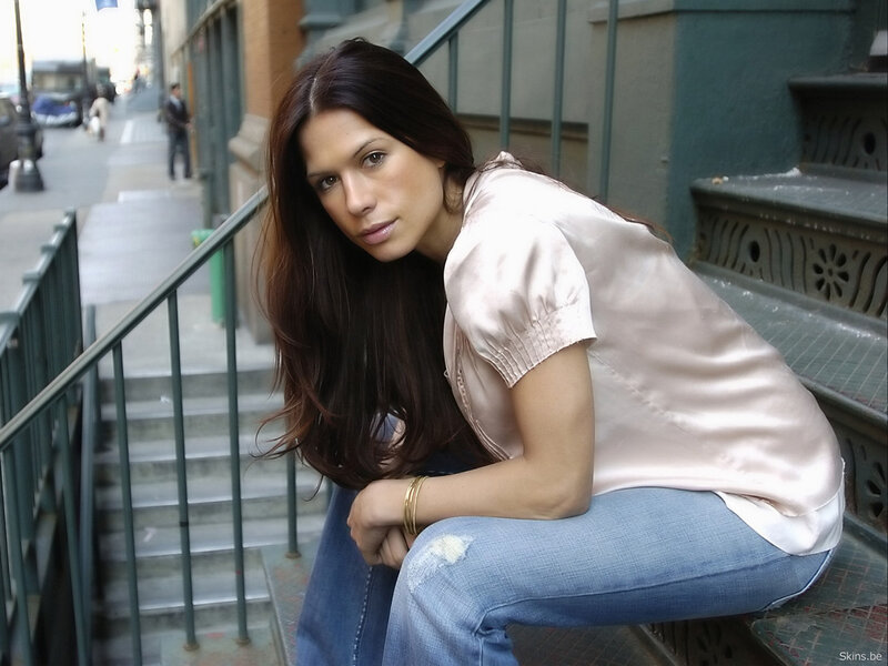 woman sitting on city steps